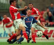 17 September 2000; Mark Herrick of Cork City in action against Paul Hegarty of Derry City during the Eircom League Premier Division match between Cork City and Derry City at Turners Cross in Cork. Photo by David Maher/Sportsfile