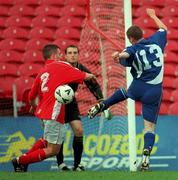 17 September 2000; Darren McCaul of Derry City volleys the ball past Neal Horgan and goalkeeper Noel Mooney to score his sides second goal during the Eircom League Premier Division match between Cork City and Derry City at Turners Cross in Cork. Photo by David Maher/Sportsfile