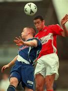 17 September 2000; Damien Delaney of Cork City in action against Eamon Doherty of Derry City during the Eircom League Premier Division match between Cork City and Derry City at Turners Cross in Cork. Photo by David Maher/Sportsfile