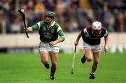 17 September 2000; Donnacha Sheehan of Limerick races clear of Jamie Cannon of Galway during the All Ireland Under-21 Hurling Championship Final match between Galway and Limerick at Semple Stadium in Thurles, Tipperary. Photo by Damien Eagers/Sportsfile