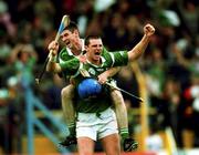 17 September 2000; Limerick forwards Brian Begley and Paul O'Grady celebrate at the final whistle following the All Ireland Under-21 Hurling Championship Final match between Galway and Limerick at Semple Stadium in Thurles, Tipperary. Photo by Damien Eagers/Sportsfile