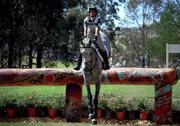 18 September 2000; Ireland's Patricia Donegan riding Don't Step Back clears the 3rd fence during the Cross Country discipline of the Team 3 Day Eventing. Horsley Park Equestrian Centre, Sydney West, Australia. Photo by Brendan Moran/Sportsfile