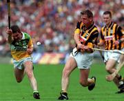 10 September 2000; Eamon Kavanagh of Kilkenny in action against Johnny Pilkington of Offaly during the All-Ireland Senior Hurling Championship Final match between Kilkenny and Offaly at Croke Park in Dublin. Photo by Ray McManus/Sportsfile