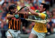 10 September 2000; Kevin Kinahan of Offaly in action against DJ Carey of Kilkenny during the All-Ireland Senior Hurling Championship Final match between Kilkenny and Offaly at Croke Park in Dublin. Photo by Matt Browne/Sportsfile