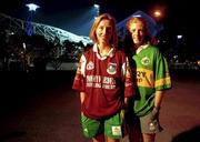 21 September 2000; Ireland's Olympic female walkers, Olive Loughnane, left who comes from Galway and Gillian O'Sullivan, who comes from Kerry, who will be supporting their counties in the All-Ireland Football Final on Sunday next, pictured outside Stadium Australia, Sydney Olympic Park at Homebush Bay in Sydney, Australia. Photo by Brendan Moran/Sportsfile