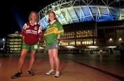 21 September 2000; Ireland's Olympic female walkers, Olive Loughnane, left who comes from Galway and Gillian O'Sullivan, who comes from Kerry, who will be supporting their counties in the All-Ireland Football Final on Sunday next, pictured outside Stadium Australia, Sydney Olympic Park at Homebush Bay in Sydney, Australia. Photo by Brendan Moran/Sportsfile