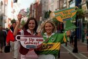 22 September 2000; Models Lorraine Mannion, Galway jersey, (left) and Jennifer Langan, Kerry jersey pictured with the last two tickets for Sunday's Bank of Ireland All Ireland Football Final between Galway and Kerry. Photo by Damien Eagers/Sportsfile