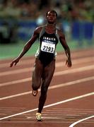 22 September 2000; Jamacica's Merlene Ottey on her way to winning her heat of the Women's 400m. Stadium Australia, Sydney Olympic Park. Homebush Bay, Sydney, Australia. Photo by Brendan Moran/Sportsfile