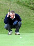 23 September 2000; Willie Buckley of Beech Park lines up a putt on the 10th during the Bulmers Jimmy Bruen Shield Final at Lahinch Golf Course, Lahinch in Clare. Photo by Ray McManus/Sportsfile