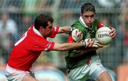 24 September 2000: Conor Moran of Mayo in action against Mark O'Connor of Cork during the All Ireland Minor Football Championship Final match between Cork and Mayo at Croke Park in Dublin. Photo by Ray McManus/Sportsfile