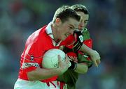 24 September 2000: Conor Brosnan of Cork in action against Rory Keane of Mayo during the All Ireland Minor Football Championship Final match between Cork and Mayo at Croke Park in Dublin. Photo by Ray McManus/Sportsfile