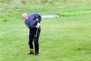 23 September 2000; Robert Gordon of Kilkeel chips on to the 10th during the Bulmers Jimmy Bruen Shield Final at Lahinch Golf Course, Lahinch in Clare. Photo by Ray McManus/Sportsfile