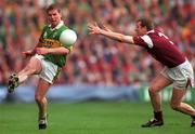 24 September 2000; Dara O'Cinneide of Kerry is tackled by Gary Fahey of Galway during the Bank of Ireland All-Ireland Football Championship Final Replay between Galway and Kerry at Croke Park in Dublin. Photo by Ray McManus/Sportsfile