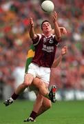 24 September 2000; Padraic Joyce of Galway gathers the ball ahead of Eamon Fitzmaurice of Kerry during the Bank of Ireland All-Ireland Football Championship Final Replay between Galway and Kerry at Croke Park in Dublin. Photo by Ray McManus/Sportsfile