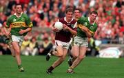 24 September 2000; Michael Donnellan of Galway in action against Tomas O'Se, right, and Darragh O'Se of Kerry during the Bank of Ireland All-Ireland Football Championship Final Replay between Galway and Kerry at Croke Park in Dublin. Photo by Ray McManus/Sportsfile