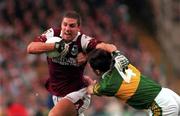 24 September 2000; Kevin Walsh of Galway goes past the challenge of Michael McCarthy of Kerry during the Bank of Ireland All-Ireland Football Championship Final Replay between Galway and Kerry at Croke Park in Dublin. Photo by Ray McManus/Sportsfile
