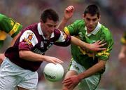 24 September 2000; Tommy Joyce of Galway is tackled by Aodan MacGearailt of Kerry during the Bank of Ireland All-Ireland Football Championship Final Replay between Galway and Kerry at Croke Park in Dublin. Photo by Ray McManus/Sportsfile