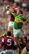 24 September 2000; Kevin Walsh of Galway goes up for the ball with Donal Daly of Kerry during the Bank of Ireland All-Ireland Football Championship Final Replay between Galway and Kerry at Croke Park in Dublin. Photo by Ray McManus/Sportsfile