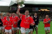 24 September 2000: Cork captain James Masters with the cup after the All Ireland Minor Football Championship Final match between Cork and Mayo at Croke Park in Dublin. Photo by Ray McManus/Sportsfile