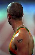23 September 2000; Ireland's Tom McGuirk pictured after his Men's 400m Hurdles heat from which he failed to qualify for the next round. Stadium Australia, Sydney Olympic Park. Homebush Bay, Sydney, Australia. Photo by Brendan Moran/Sportsfile