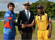 23 July 2015; Asghar Stanikzai, Afghanistan captain, shakes hands with Jack Vare, Papua New Guinea captain, in the company of match referee Graeme LaBrooy. ICC World Twenty20 Qualifier 2015, Play-Off 3, Papua New Guinea v Afghanistan. Malahide, Dublin. Picture credit: Cody Glenn / ICC / SPORTSFILE