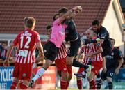 24 July 2015; Jason McGuinness, St Patrick's Athletic, clashes with Sligo Rovers goalkeeper Richard Brush, resulting in the St.Patrick's Athletic player being substituted due to injury. SSE Airtricity League Premier Division, Sligo Rovers v St Patrick's Athletic. The Showgrounds, Sligo. Picture credit: David Maher / SPORTSFILE