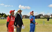 25 July 2015; Ashgar Stanikzai, Afghanistan, tosses the coin in front of match referee Graeme LaBrooy and Sultan Ahmed, Oman. ICC World Twenty20 Qualifier 2015 5th/6th Play-Off, Afghanistan v Oman. Malahide, Dublin. Picture credit: Sam Barnes / ICC / SPORTSFILE