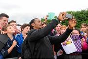 24 July 2015; Yohan Blake, Jamaica, poses with fans, after winning The Aon Men's International 100m event. Morton Games International Athletics Meeting. Morton Stadium, Santry, Co. Dublin. Picture credit:  Tomás Greally / SPORTSFILE