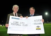 4 November 2008; General Manager of Cork City FC Gerry Nagle, right, is presented with a cheque for €150,000 by Chairman of the Setanta Sports Cup Organising Commitee Milo Corcoran for their cup final win. eircom League of Ireland Premier Division, St. Patrick's Athletic v Cork City, Richmond Park, Dublin. Picture credit: Brian Lawless / SPORTSFILE