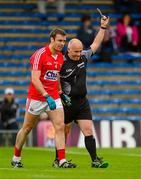 25 July 2015; James Loughrey, Cork, is shown the black card by referee Marty Duffy during the first half. GAA Football All-Ireland Senior Championship, Round 4A, Kildare v Cork. Semple Stadium, Thurles, Co. Tipperary. Picture credit: Piaras Ó Mídheach / SPORTSFILE