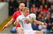25 July 2015; Tommy Moolick, Kildare, in action against Alan O'Connor, Cork. GAA Football All-Ireland Senior Championship, Round 4A, Kildare v Cork. Semple Stadium, Thurles, Co. Tipperary. Picture credit: Piaras Ó Mídheach / SPORTSFILE