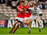 25 July 2015; Cathal McNally, Kildare, in action against Barry O'Driscoll, Cork. GAA Football All-Ireland Senior Championship, Round 4A, Kildare v Cork. Semple Stadium, Thurles, Co. Tipperary. Picture credit: Piaras Ó Mídheach / SPORTSFILE
