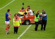 25 July 2015; Eamonn Callaghan, Kildare, is attended to by medics after an aerial collision with Cork goalkeeper Ken O'Halloran, left. GAA Football All-Ireland Senior Championship, Round 4A, Kildare v Cork. Semple Stadium, Thurles, Co. Tipperary. Picture credit: Piaras Ó Mídheach / SPORTSFILE