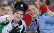 24 July 2015; Team Ireland’s Lydia McGowan, a member of Bray Lakers Special Olympics Club, from Leeson Street, Dublin City Centre, with  with Garda sargent Michaela Moloney, from Henry Street station, Limerick, and a member of the Law Enforcement Torch Run Team during the opening ceremony of the Special Olympics World Summer Games. LA Memorial Coliseum, Los Angeles, United States. Picture credit: Ray McManus / SPORTSFILE