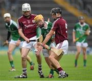 26 July 2015; Darragh Carroll, Limerick, in action against Jack Coyne, left, and Caelom Mulry, Galway. Electric Ireland GAA Hurling All-Ireland Minor Championship, Quarter-Final, Limerick v Galway. Semple Stadium, Thurles, Co. Tipperary. Picture credit: Stephen McCarthy / SPORTSFILE