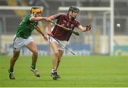 26 July 2015; Seán Loftus, Galway, in action against Thomas Grimes, Limerick. Electric Ireland GAA Hurling All-Ireland Minor Championship, Quarter-Final, Limerick v Galway. Semple Stadium, Thurles, Co. Tipperary. Picture credit: Piaras Ó Mídheach / SPORTSFILE