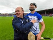 26 July 2015; Waterford manager Derek McGrath and Darragh Fives celebrate their side's victory. GAA Hurling All-Ireland Senior Championship, Quarter-Final, Dublin v Waterford. Semple Stadium, Thurles, Co. Tipperary. Picture credit: Stephen McCarthy / SPORTSFILE