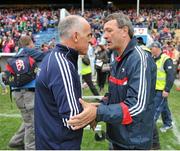 26 July 2015; Galway manager Anthony Cunningham and Cork manager Jimmy Barry Murphy shake hands after the game. GAA Hurling All-Ireland Senior Championship, Quarter-Final, Galway v Cork. Semple Stadium, Thurles, Co. Tipperary. Picture credit: Dáire Brennan / SPORTSFILE