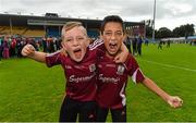 26 July 2015; Galway supporters Patrick O'Halloran, age 11, left, and Luke McClean, age 13, celebrate Galway's win. GAA Hurling All-Ireland Senior Championship, Quarter-Final, Galway v Cork. Semple Stadium, Thurles, Co. Tipperary. Picture credit: Stephen McCarthy / SPORTSFILE