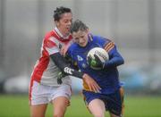 8 November 2008; Ciara O'Loughlin, Mountmellick Sarsfields, in action against Orla Cotter, Inch Rovers. Vhi Healthcare All-Ireland Senior Club semi-final, Inch Rovers, Cork v Mountmellick Sarsfields, Laois, Killeagh GFC, Co. Cork. Picture credit: Pat Murphy / SPORTSFILE