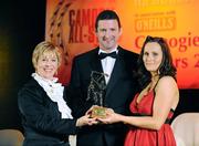 8 November 2008; Aoife Murray, of Cork, is presented with her Camogie All-Star Award by President of the Camogie Association Liz Howard and Guest of Honour - Tipperary hurler - Brendan Cummins. Camogie All-Star Awards 2008 in association with O’Neills, Citywest Hotel, Conference, Leisure & Golf Resort, Dublin. Picture credit: Ray McManus / SPORTSFILE