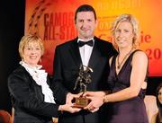 8 November 2008; Sinead Cahalan, of Galway, is presented with her Camogie All-Star Award by President of the Camogie Association Liz Howard and Guest of Honour - Tipperary hurler - Brendan Cummins. Camogie All-Star Awards 2008 in association with O’Neills, Citywest Hotel, Conference, Leisure & Golf Resort, Dublin. Picture credit: Ray McManus / SPORTSFILE
