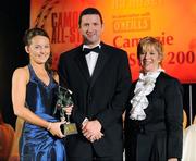 8 November 2008; Carina Roseingrave, of Clare, is presented with the Young Camogie Player of the Year Award by President of the Camogie Association Liz Howard and Guest of Honour - Tipperary hurler - Brendan Cummins. Camogie All-Star Awards 2008 in association with O’Neills, Citywest Hotel, Conference, Leisure & Golf Resort, Dublin. Picture credit: Ray McManus / SPORTSFILE