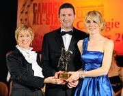 8 November 2008; Rachel Moloney, of Cork, is presented with her Camogie All-Star Award by President of the Camogie Association Liz Howard and Guest of Honour - Tipperary hurler - Brendan Cummins. Camogie All-Star Awards 2008 in association with O’Neills, Citywest Hotel, Conference, Leisure & Golf Resort, Dublin. Picture credit: Ray McManus / SPORTSFILE