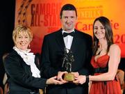 8 November 2008; Jane Adams, of Antrim, is presented with her Camogie All-Star Award by President of the Camogie Association Liz Howard and Guest of Honour - Tipperary hurler - Brendan Cummins. Camogie All-Star Awards 2008 in association with O’Neills, Citywest Hotel, Conference, Leisure & Golf Resort, Dublin. Picture credit: Ray McManus / SPORTSFILE