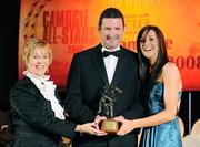 8 November 2008; Michaela Morkan, of Offaly, is presented with her Camogie All-Star Award by President of the Camogie Association Liz Howard and Guest of Honour - Tipperary hurler - Brendan Cummins. Camogie All-Star Awards 2008 in association with O’Neills, Citywest Hotel, Conference, Leisure & Golf Resort, Dublin. Picture credit: Ray McManus / SPORTSFILE