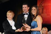 8 November 2008; Gemma O'Connor, of Cork, is presented with her Camogie All-Star Award by President of the Camogie Association Liz Howard and Guest of Honour - Tipperary hurler - Brendan Cummins. Camogie All-Star Awards 2008 in association with O’Neills, Citywest Hotel, Conference, Leisure & Golf Resort, Dublin. Picture credit: Stephen McCarthy / SPORTSFILE