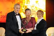 8 November 2008; Mary Moran, from Cork, receives the Sighle Nic an Ultaigh award from Liz Howard, President of the Camogie Association, right, and Ossie Kilkenny, Chairperson of the Irish Sports Council, at the Camogie All-Star Awards 2008 in association with O’Neills, Citywest Hotel, Conference, Leisure & Golf Resort, Dublin. Picture credit: Ray McManus / SPORTSFILE