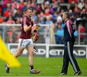 26 July 2015; Galway selector Eugene Cloonan congratulates Jonathan Glynn near the end of the game. GAA Hurling All-Ireland Senior Championship, Quarter-Final, Galway v Cork. Semple Stadium, Thurles, Co. Tipperary. Picture credit: Dáire Brennan / SPORTSFILE