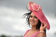 27 July 2015; Laura Fox, from Galway, strikes a pose before the races. Galway Racing Festival. Ballybrit, Galway. Picture credit: Cody Glenn / SPORTSFILE